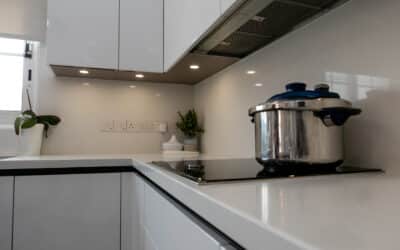 Kitchen Cabinets in White Glossy, Countertop in Luce Chiaro, Flooring & Stair Steps in Light Grey Ceramic Tiles